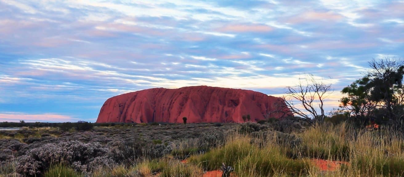Riding a motorcycle out to Uluru can be a magical experience.
