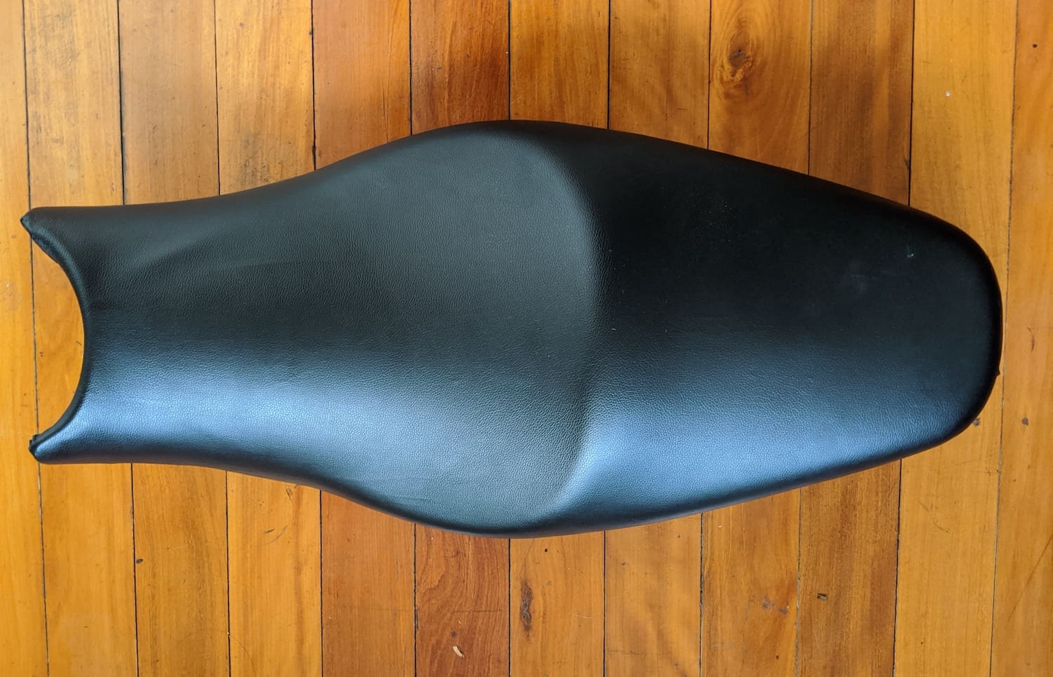 The final re-upholstered motorcycle seat — nearly perfect!
