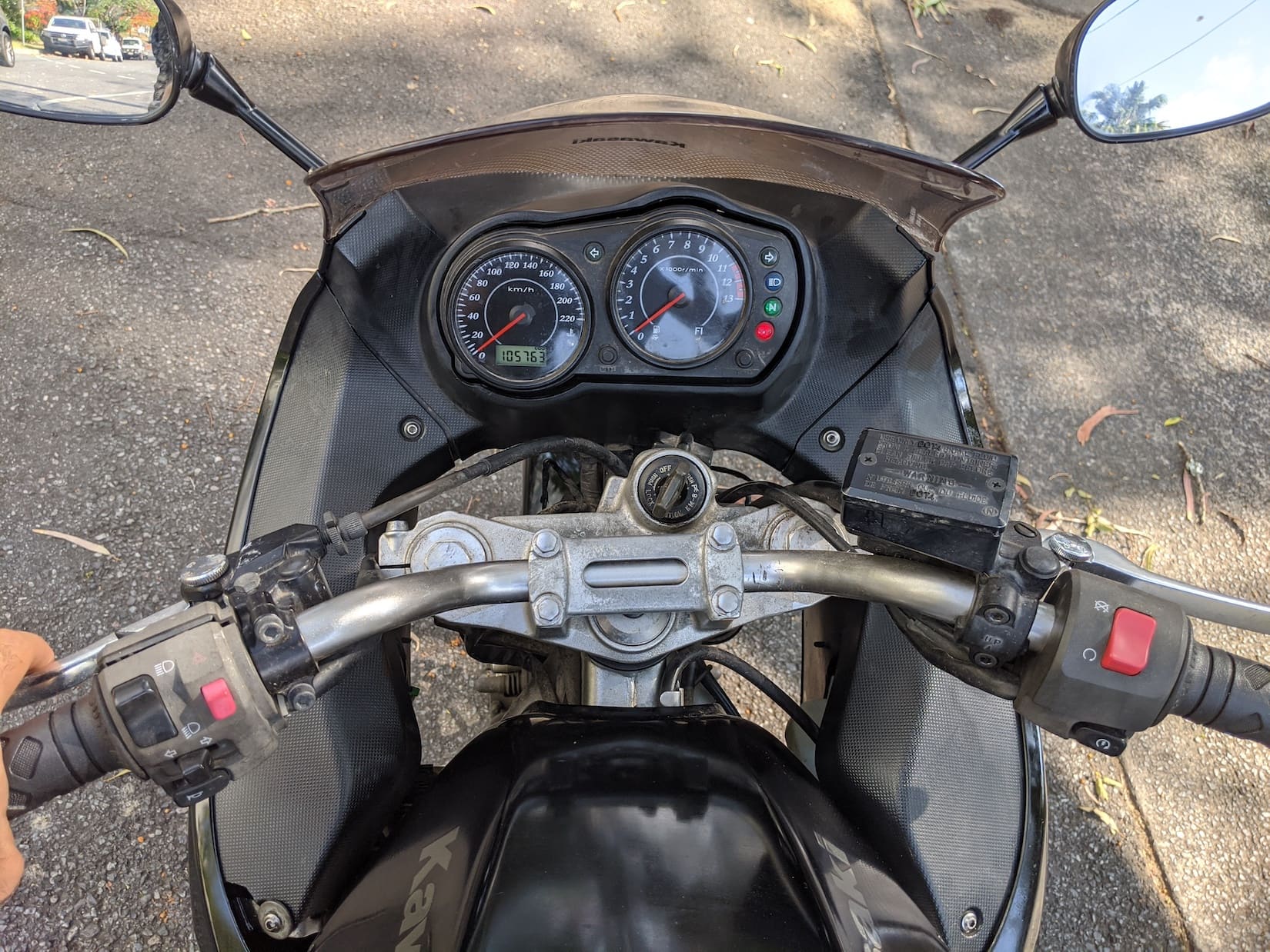 Black Kawasaki ER-6F Ninja 650 Side Cockpit and mileage