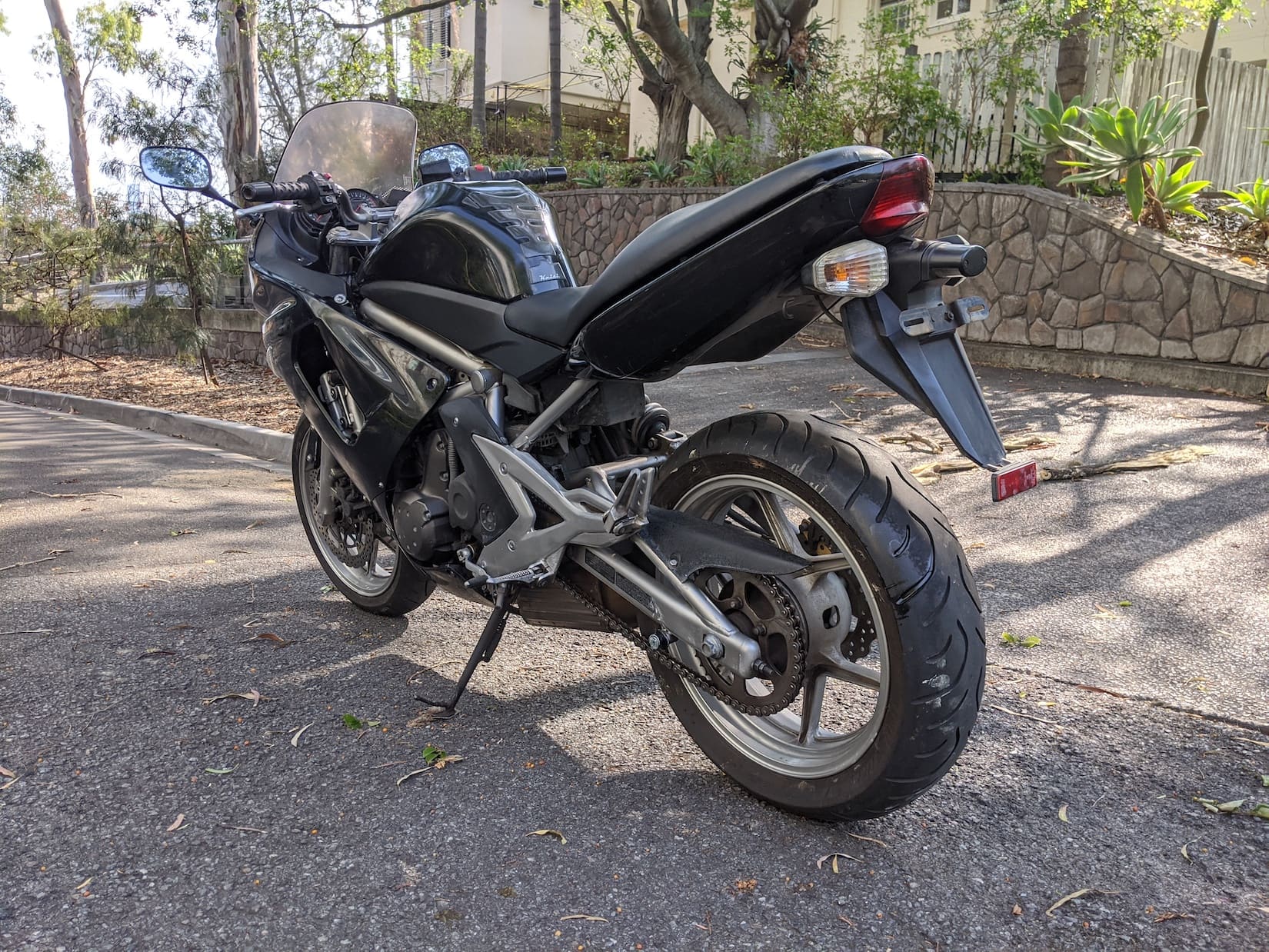 Black Kawasaki ER-6F Ninja 650 Rear view